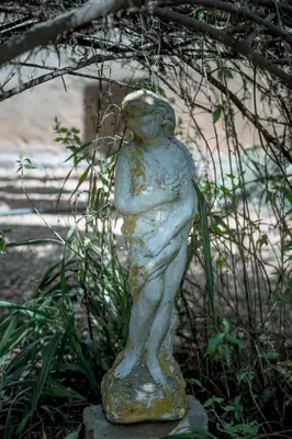 a statue of a woman standing on a rock at Blue Bell Guesthouse in Tzaneen