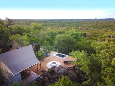 an overhead view of a house with a swimming pool at Bushveld Bivouac Private Camp in Mica