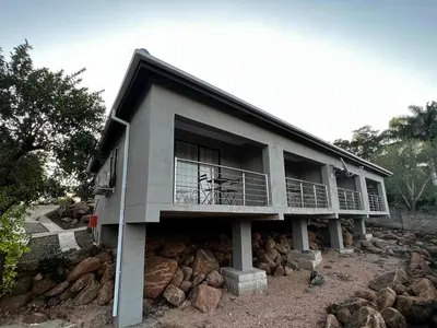 a building on top of a pile of rocks at Moya-Sky in Komatipoort