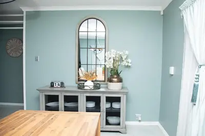 a mirror on top of a dresser in a room at Origon Farmhouse in Brits