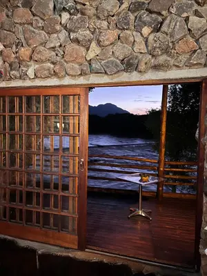 a window of a room with a view of the ocean at JakkalsDraai River Bush Lodge in Hoedspruit