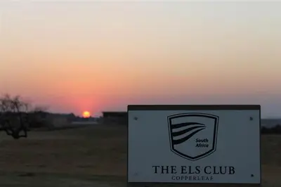 a sign for the elks club with the sunset in the background at Centurion: Chilled Townhouse in Centurion