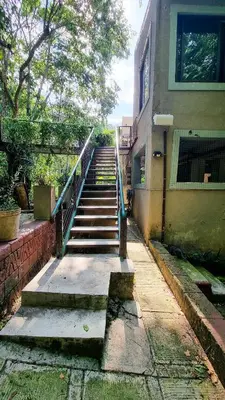 a set of stairs leading to a building at Montrose River Lodge in Schoemanskloof
