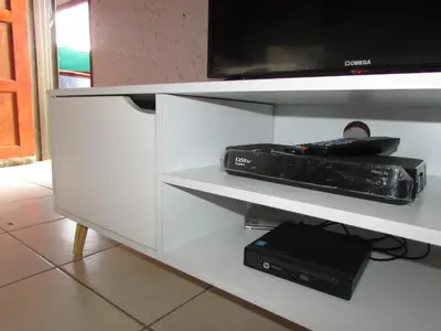 a white cabinet with a tv on top of it at Next to Dinokeng in Hammanskraal Private property in Kekana