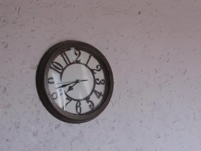 a clock on the side of a wall at Next to Dinokeng in Hammanskraal Private property in Kekana