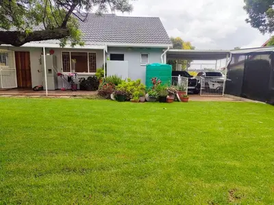 a house with a yard with green grass at Sabie House -3 bedrooms, OR Tambo, Kempton Park, Johannesburg in Kempton Park