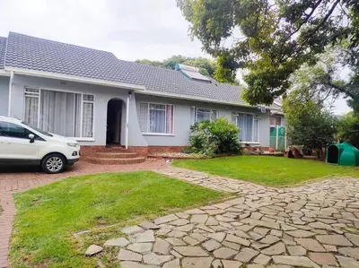 a white car parked in front of a house at Sabie House -3 bedrooms, OR Tambo, Kempton Park, Johannesburg in Kempton Park