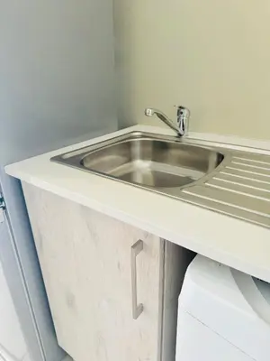 a bathroom with a sink on a counter at Gallagher Midrand BnB in Midrand