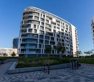 a large building in front of a building at Upmarket Executive Luxury Apartment in Midrand