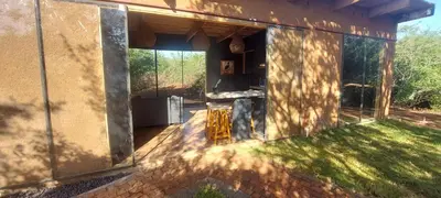 an outside view of a house with a kitchen in it at Hartbees Bush Stay #1 in Hartbeespoort
