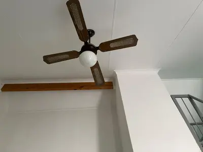 a ceiling fan on a white ceiling at Unit 24 Pendleberry Grove Holidays in Bela-Bela