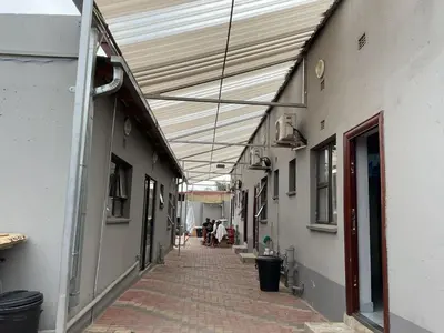 an empty alley with awning in a building at northmead lodge in Benoni