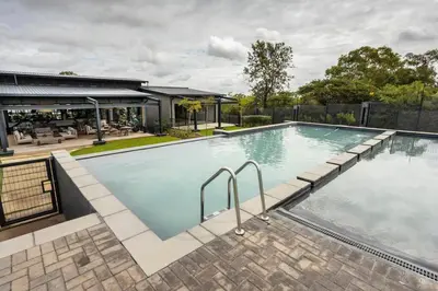 an empty swimming pool in a house at Fore's Luxurious Home in Midrand