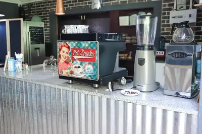 a blender sitting on a counter in a kitchen at Lodge Laske Nakke in Lydenburg