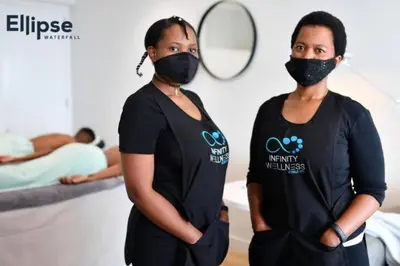two women standing in a hospital room wearing masks at Executive Suite at Ellipse Waterfall Midrand in Midrand