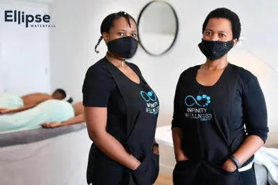 two women standing in a hospital room wearing masks at Executive Suite at Ellipse in Waterfall Midrand in Midrand