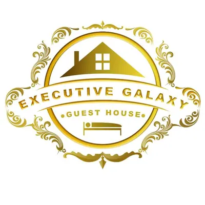 a crest logo for a luxury guest house at Executive Galaxy Guest House Nkowankowa Extension 2 in Tzaneen