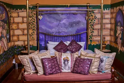 a bed in a room with pillows on it at Duck and Dine in Pretoria