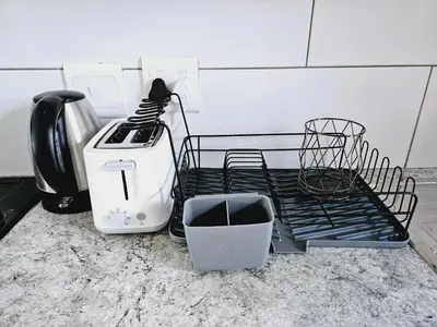 a toaster and a toaster sitting on a counter at Quantum Heights - Studio Apartment - 2 nights minimum booking in Fourways
