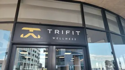 a sign on the front of a building at Keza Cove at Waterfall Ellipse in Midrand